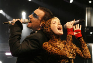 Bono, invitat surpriza la  un concert sustinut de Kylie Minogue