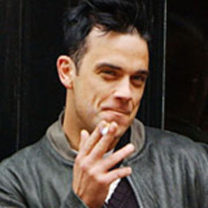 Wentz de la Fall Out Boy ii da mana libera lui Robbie Williams