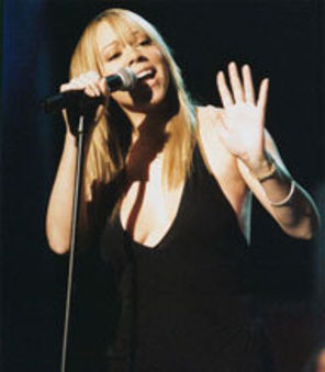 Mariah Carey - la un pas de Elvis, la doi de Beatles