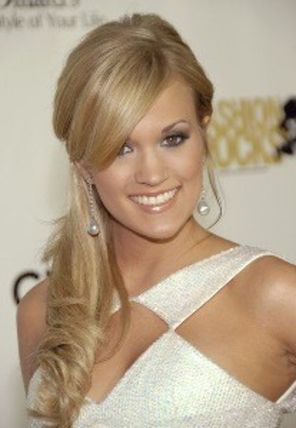 Carrie Underwood, condusa la altar de cainele ei