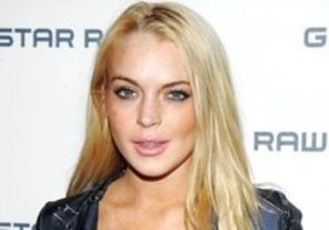 Lindsay Lohan, prinsa in timp ce injecta in brat (poze)