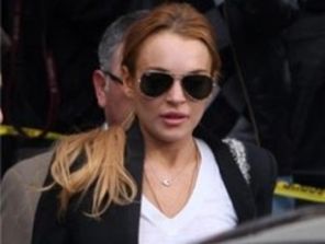 PETA se ofera sa o ajute cu bani pe Lindsay Lohan cu o conditie...