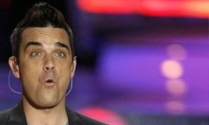 Robbie Williams vrea copii in 2012