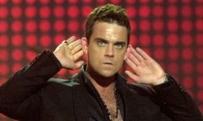 Robbie Williams si-a pierdut virginitate in uniforma scolara