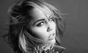 Miley Cyrus, acuzata ca a injurat o fana (video)