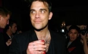 Robbie Williams vrea sa ii detroneze pe Michael Jackson si Take That
