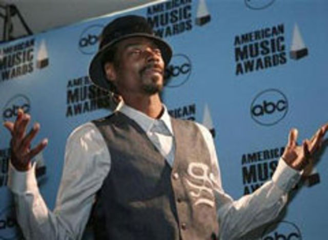 Snoop Dogg si John Legend - participanti la WrestleMania
