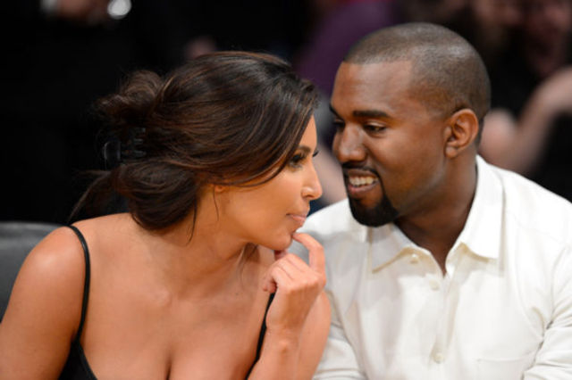 Kim Kardashian si Kanye West vor avea o fetita