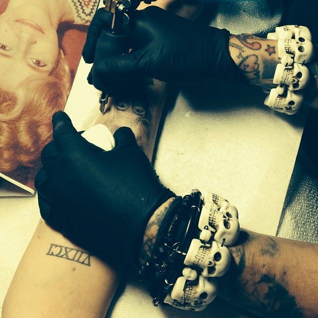Miley Cyrus tatuaj