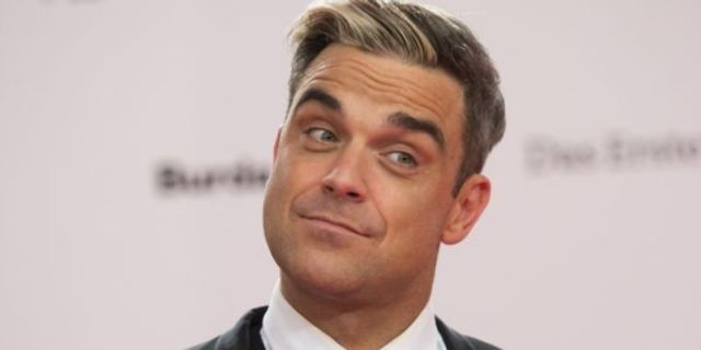 Robbie Williams a reusit sa surprinda la un eveniment caritabil