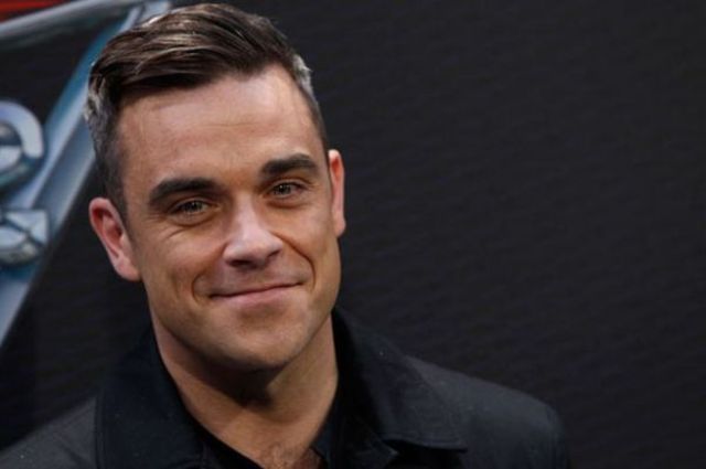 Robbie Williams a lansat clipul piesei "Love My Life"